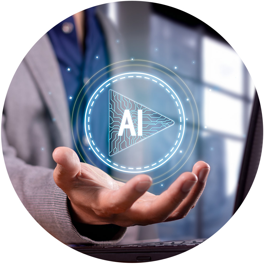 Eine Person im Anzug hält einen leuchtenden digitalen Play-Button mit „KI“ darin, der den Innovationsgeist der KI-Workshops symbolisiert. Im Hintergrund ist ein verschwommenes Fenster zu sehen, das auf eine technologieorientierte Umgebung hindeutet, die zu innovativen Ideen inspiriert.